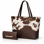 2 piece black cow print tote bag set for women with roomy shoulder bag and matching accessory pouch