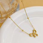 QCT-176 Knot Shape Ball Stainless Steel Necklace – Elegant Women’s Pendant