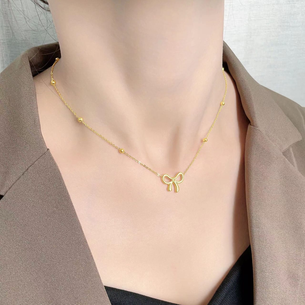 QCT-176 Knot Shape Ball Stainless Steel Necklace – Elegant Women’s Pendant