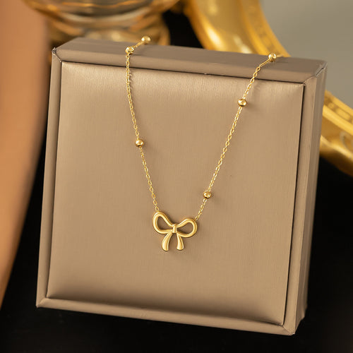 QCT-176 Knot Shape Ball Stainless Steel Necklace – Elegant Women’s Pendant