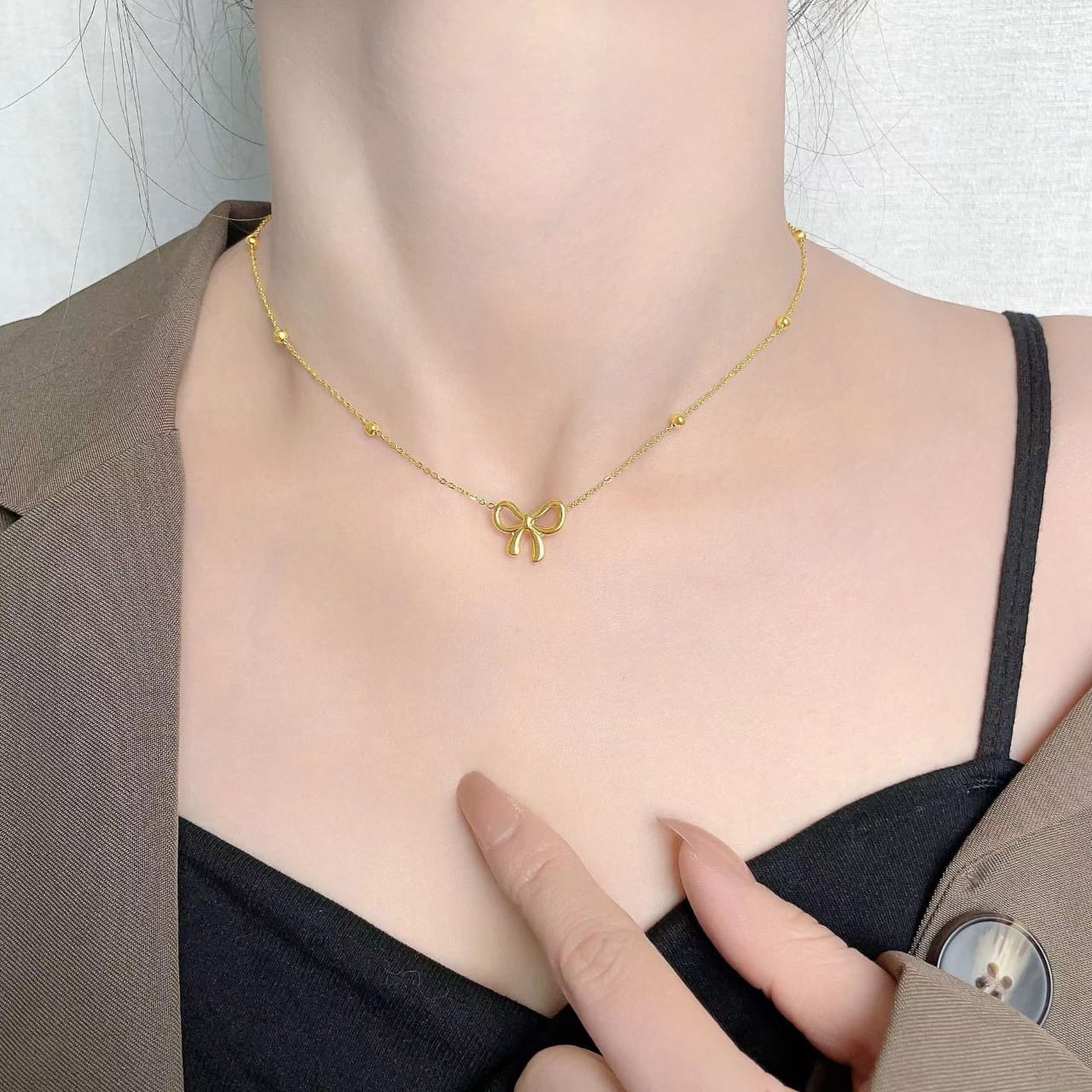 QCT-176 Knot Shape Ball Stainless Steel Necklace – Elegant Women’s Pendant