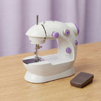 SM-202A Mini Electric Sewing Machine – Double Thread & 2-Speed Portable Sewing Machine