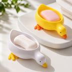 Duck-shaped soap holder adds a playful touch to everyday soap storage.