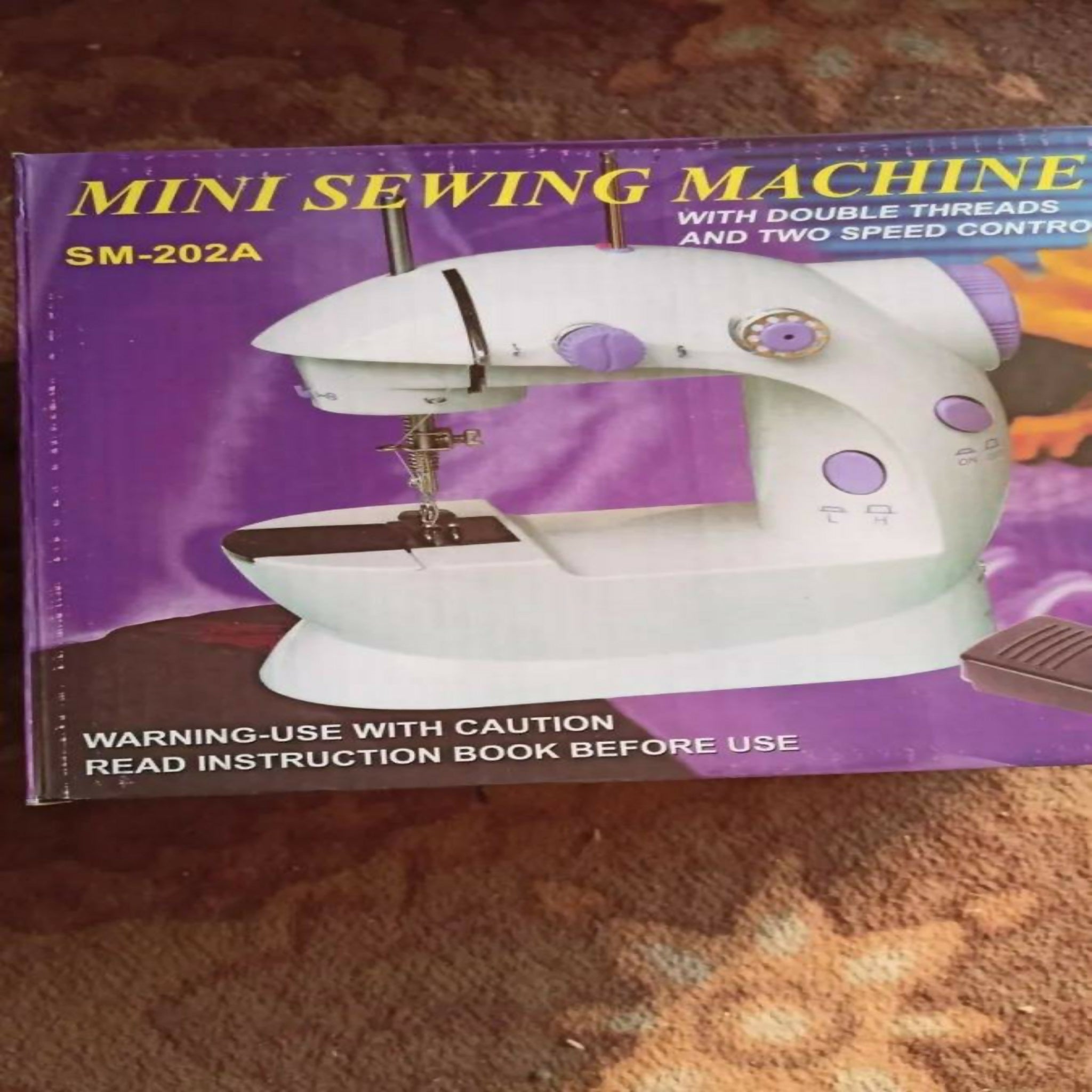 SM-202A Mini Electric Sewing Machine – Double Thread & 2-Speed Portable Sewing Machine