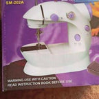 SM-202A Electric Mini Sewing Machine – Double Threads & Two Speed Control for Home & Travel