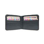 Interior of Cashy black wallet showing multiple card slots and cash compartments