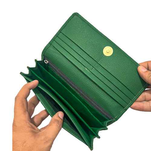 Interior of Aluna green wallet showing card slots and spacious compartments