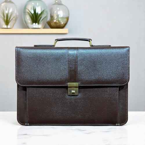 Flat lay of executive business bag in premium vegan leather – clean, modern aesthetic