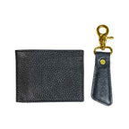 Gift box containing black leather men’s wallet and keychain – premium presentation